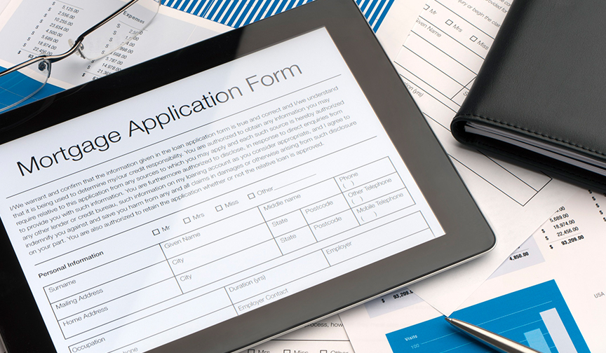 A mortgage application sits on a table