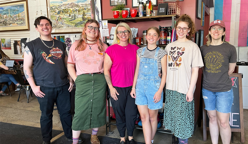 Emily Potts stands with her employees at Sugar House Coffee